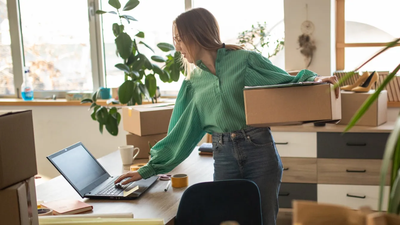 eBay Seller holding packages