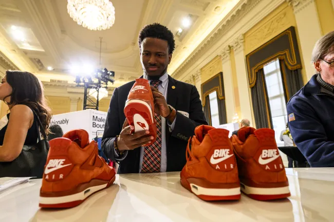 Man looking at sneakers